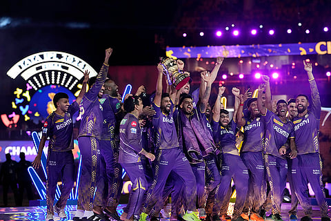 KKR players celebrate with the trophy